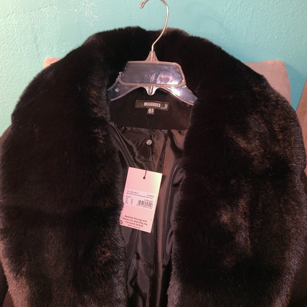 Luxurious fur collar, cuff coat.